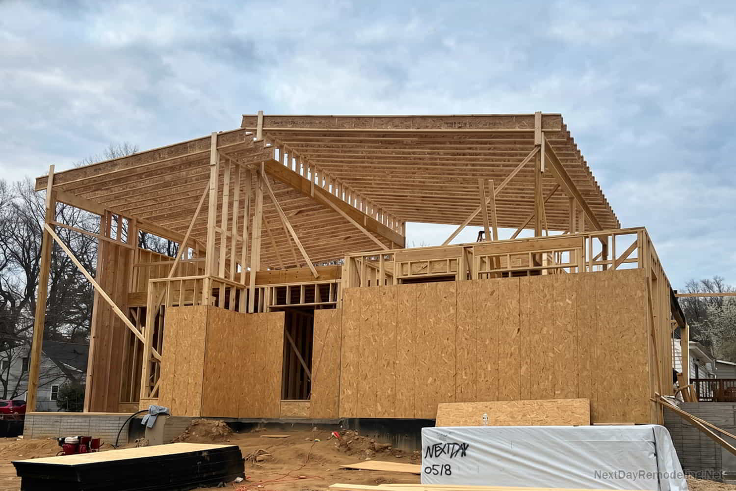 Foundation and framing of new custom home before