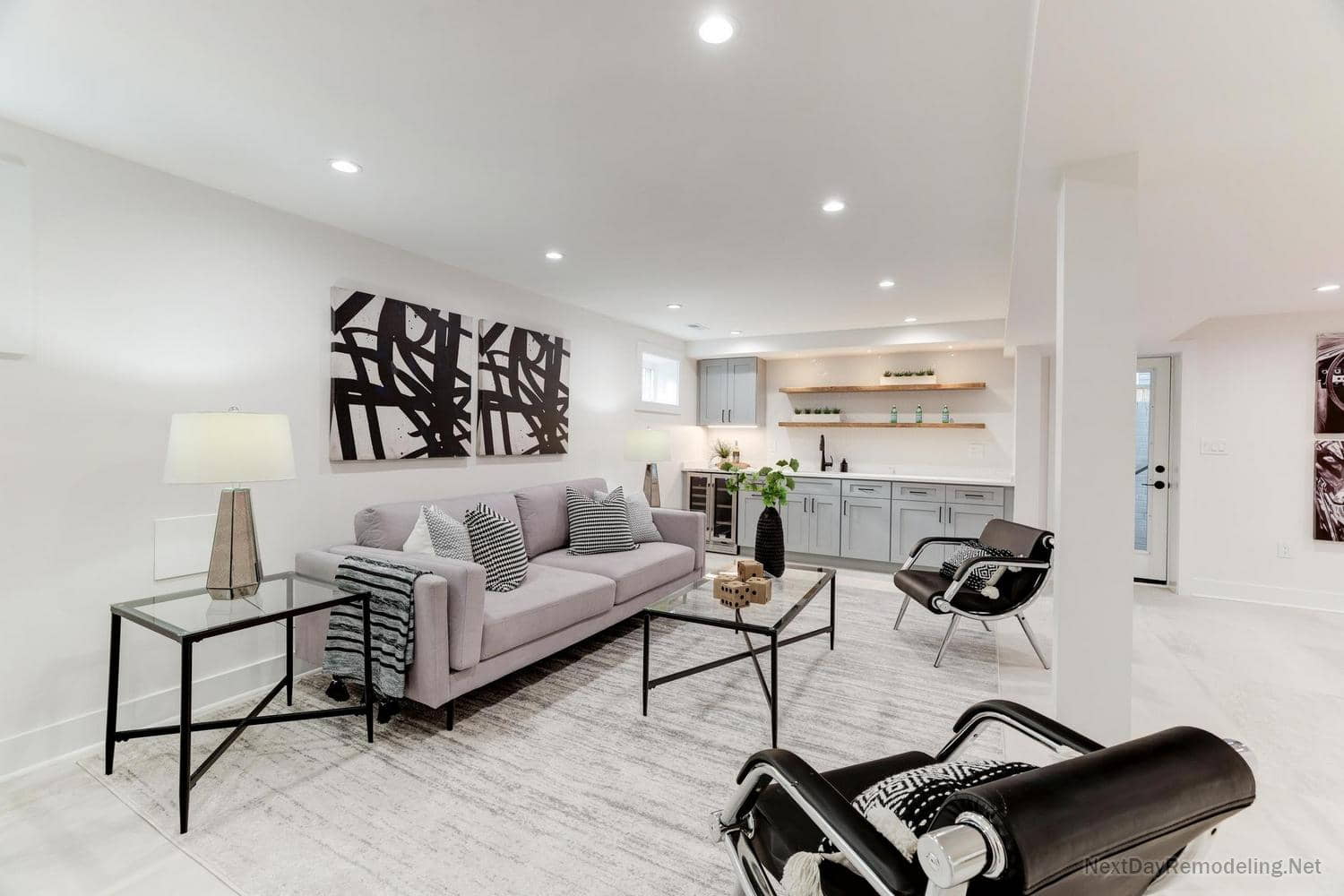 Finished luxury open-concept basement remodel with wet bar and walkup exit in Alexandria VA - after